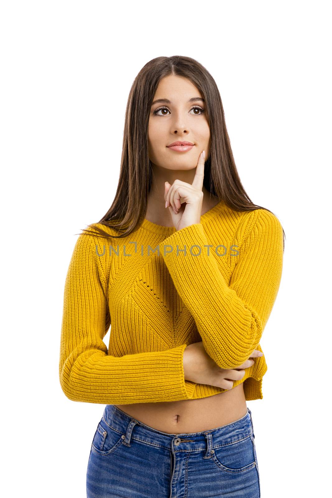 Beautiful and happy girl thinking, isolated over white background 