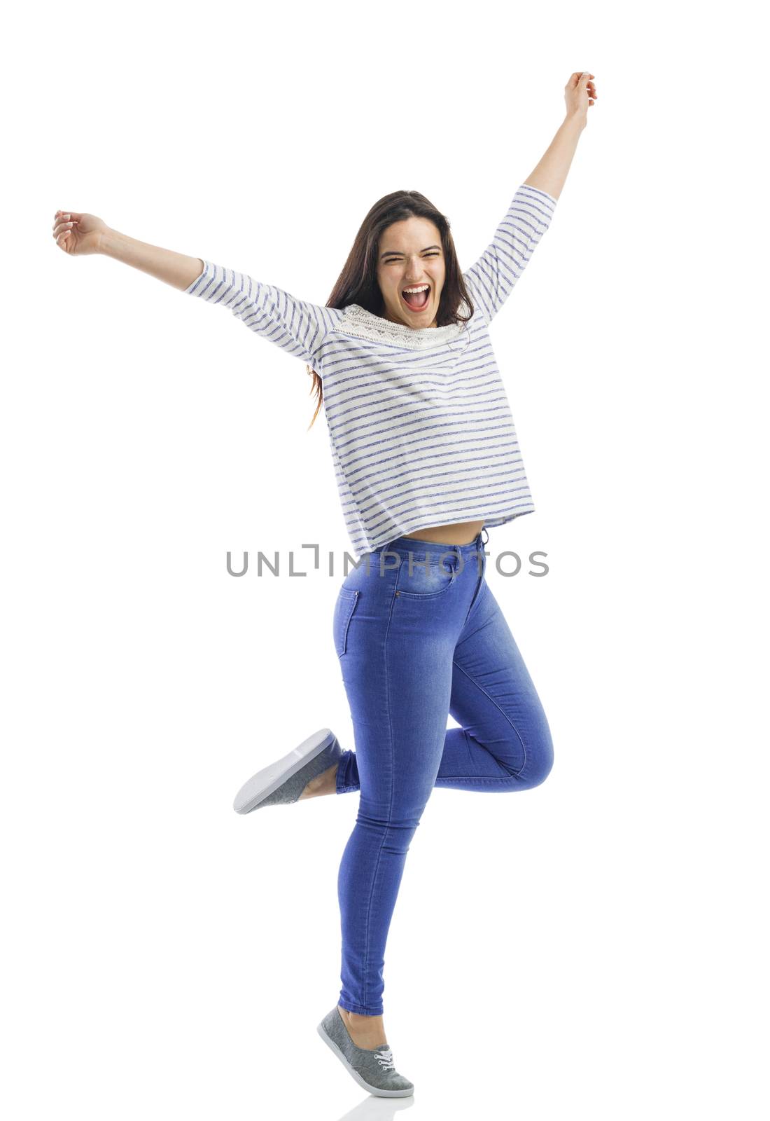 Lovely happy woman jumping of joy 