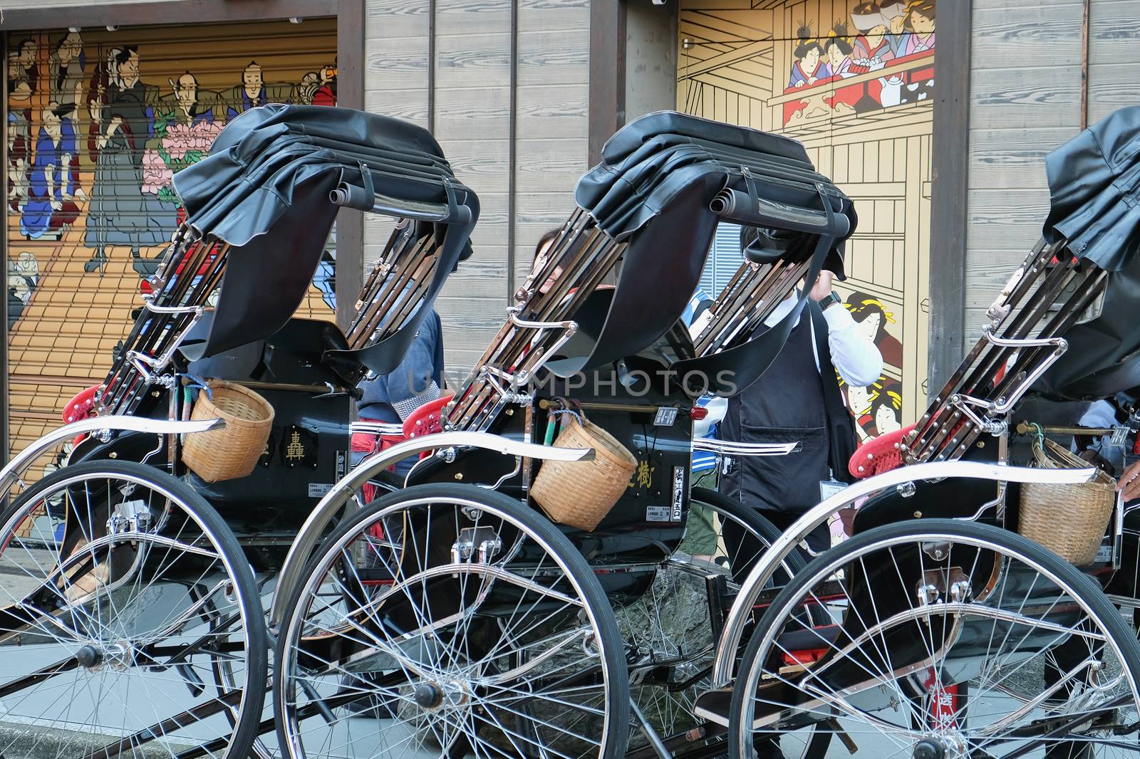 TOKYO, JAPAN - MARCH 29 2016 :rickshaw waiting area near the around Senso-ji Temple in Asakusa on March 29 2016. The Rickshaws are a popular way to tour the city.