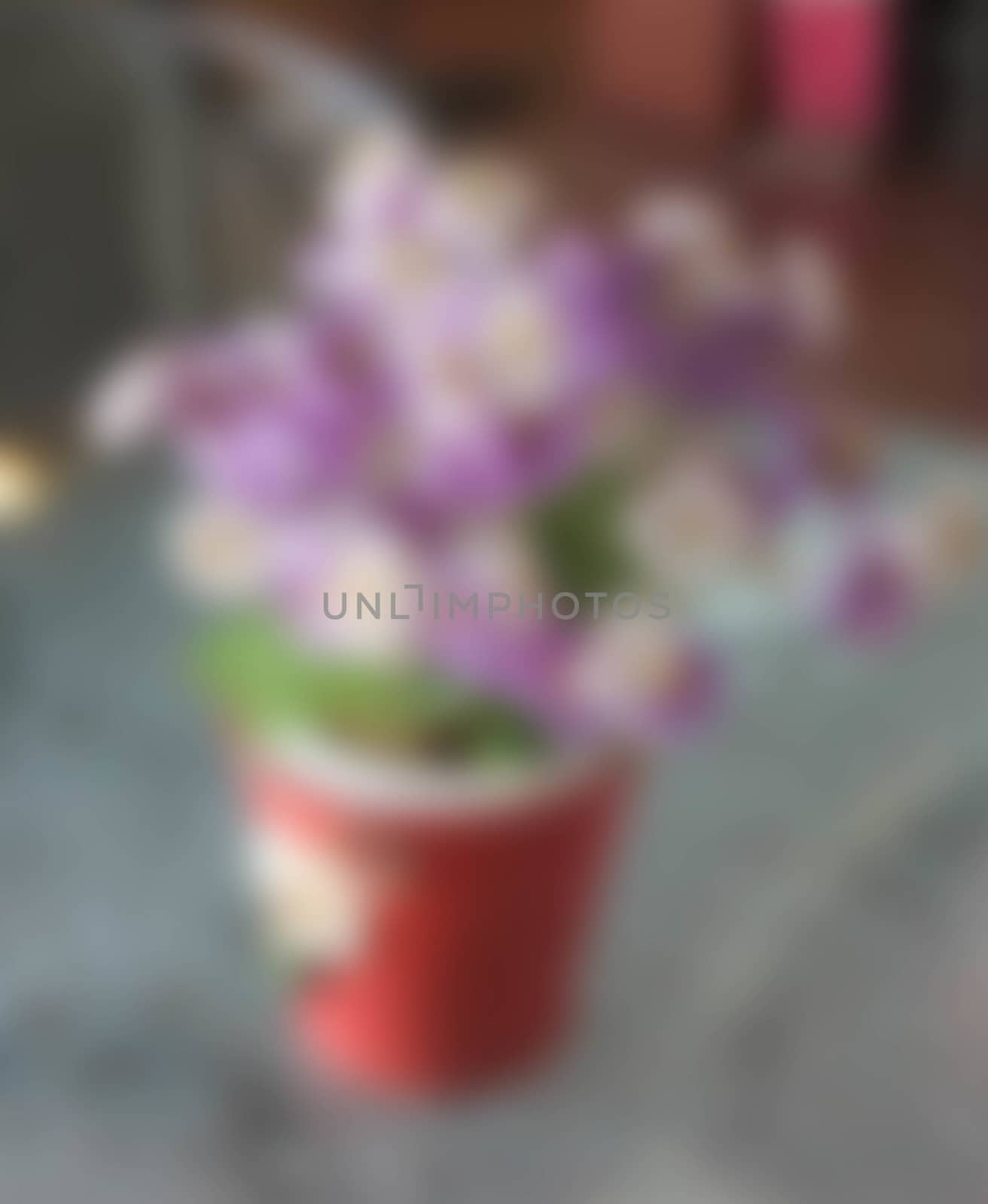 Small flower pots bokeh blur background.