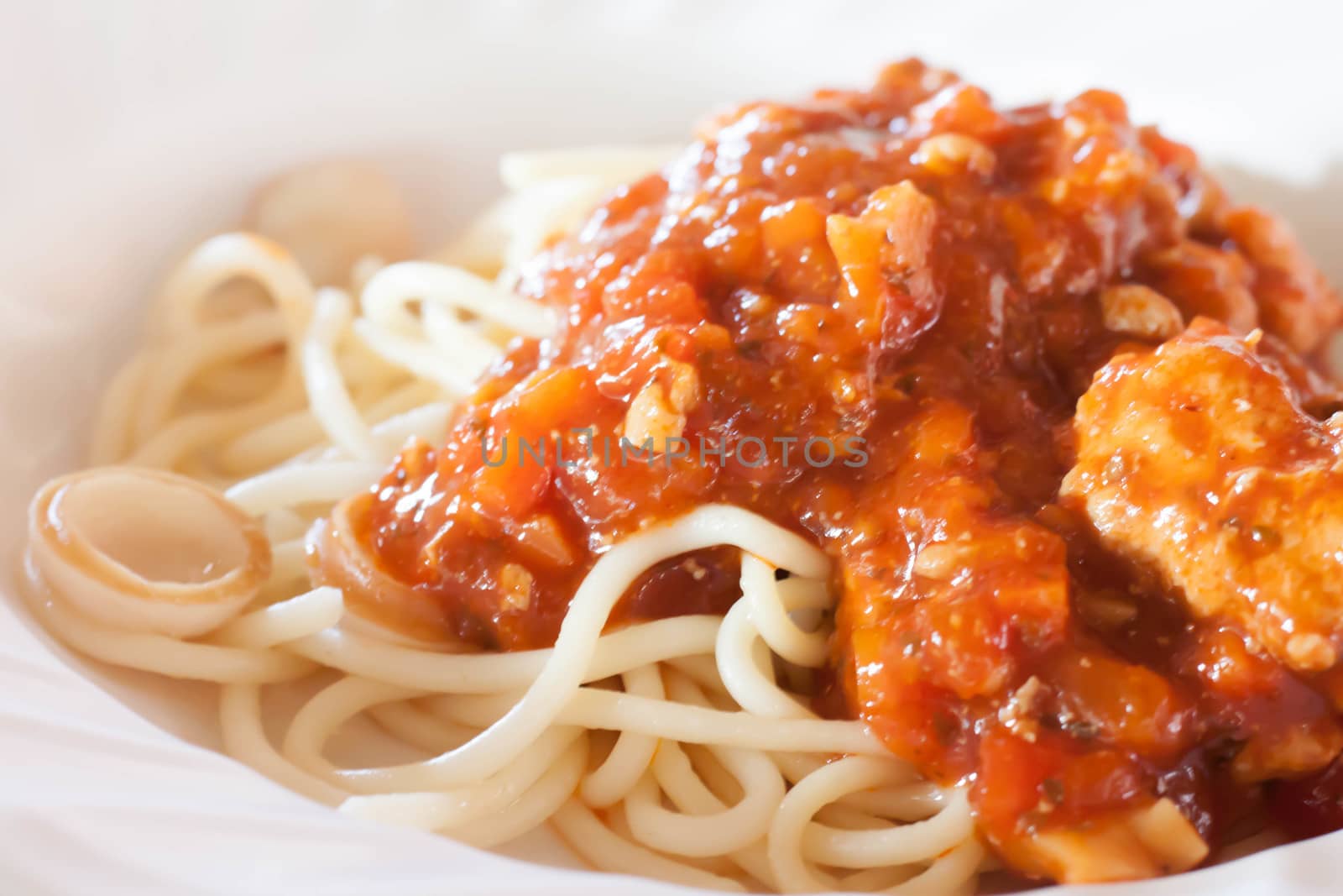 Spaghetti with tomato sauce.