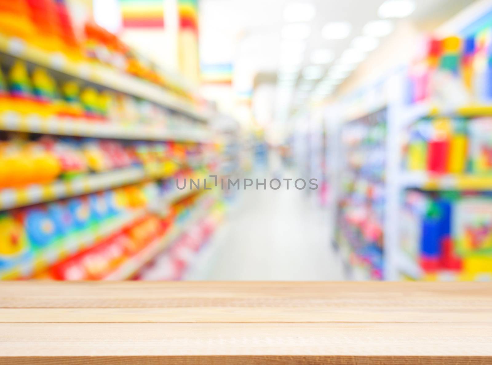 Wooden empty table in front of blurred background by fascinadora