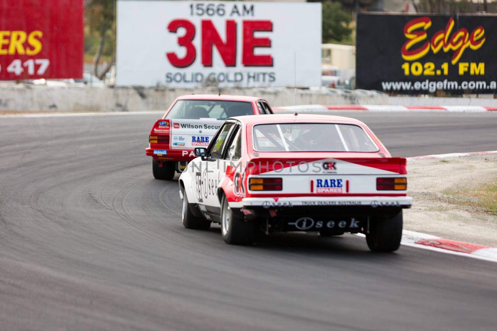 MELBOURNE, WINTON/AUSTRALIA, 22 MAY , 2016: Classic race cars rouding turn 1 at Winton.