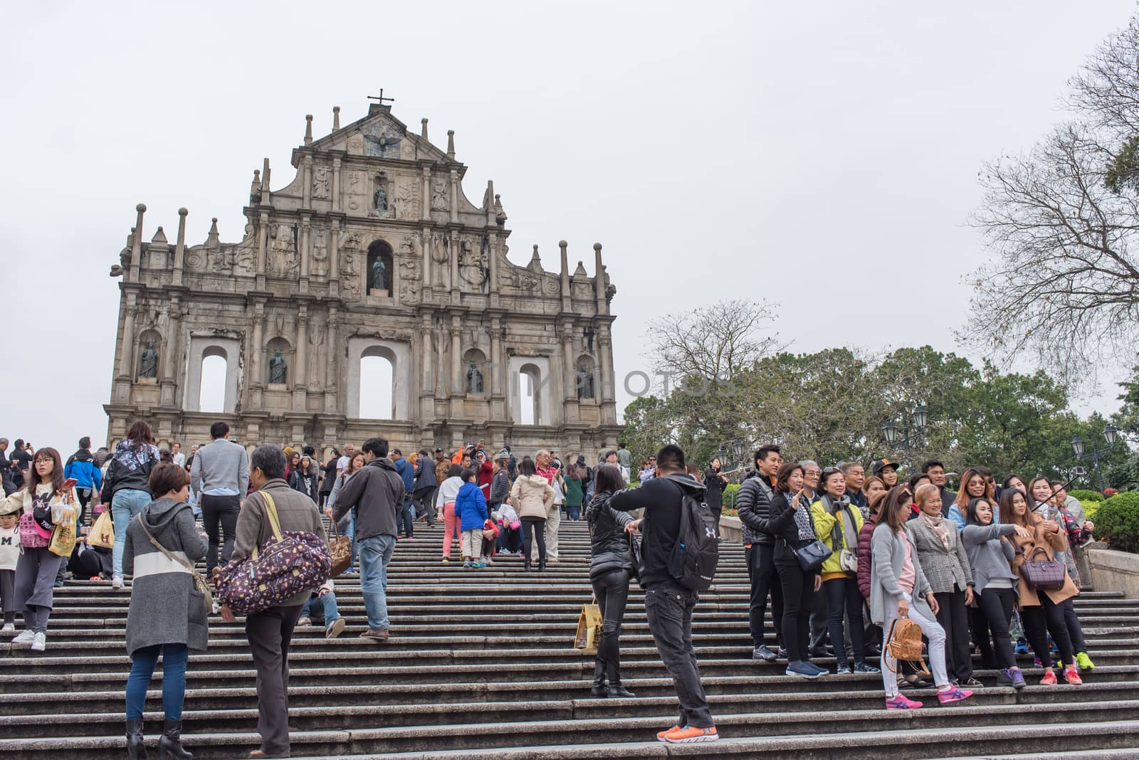 MACAU - March 14, 2016: Ruins of Saint Paul's Cathedral - the famous landmarks of Macau. The Historic Centre of Macau, a UNESCO World Heritage Site.