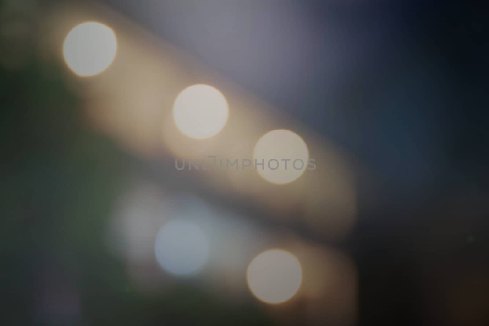 Abstract black and gray bokeh background.