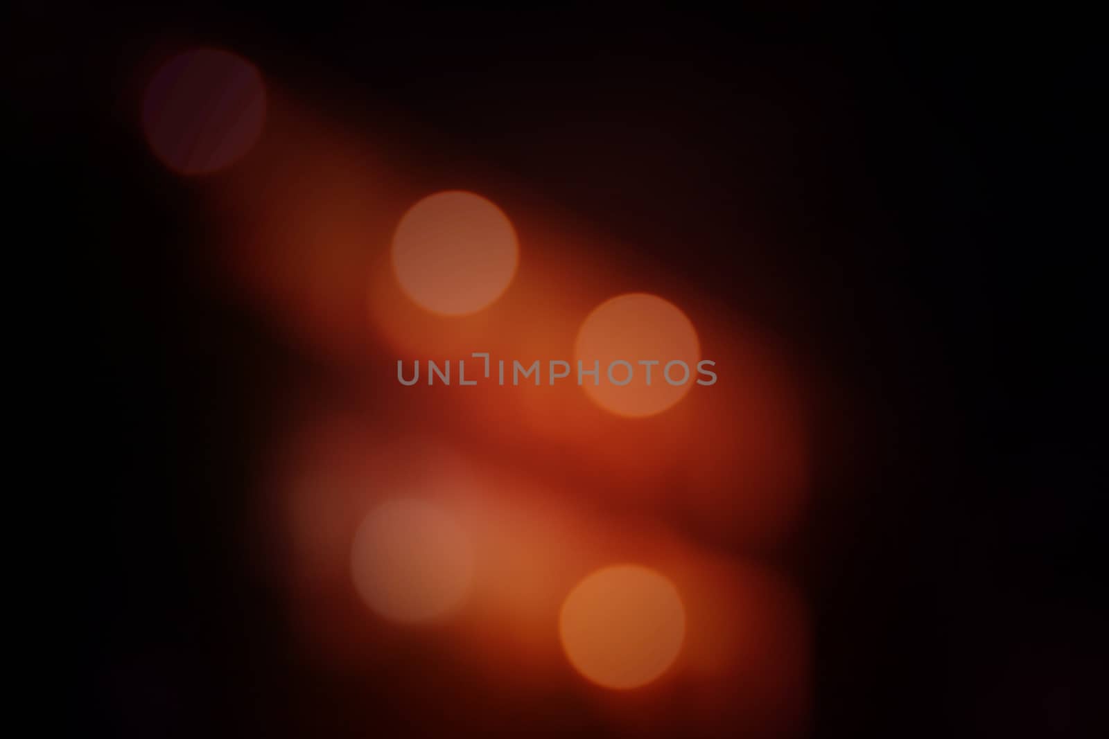 Orange light on a black background. by primzrider