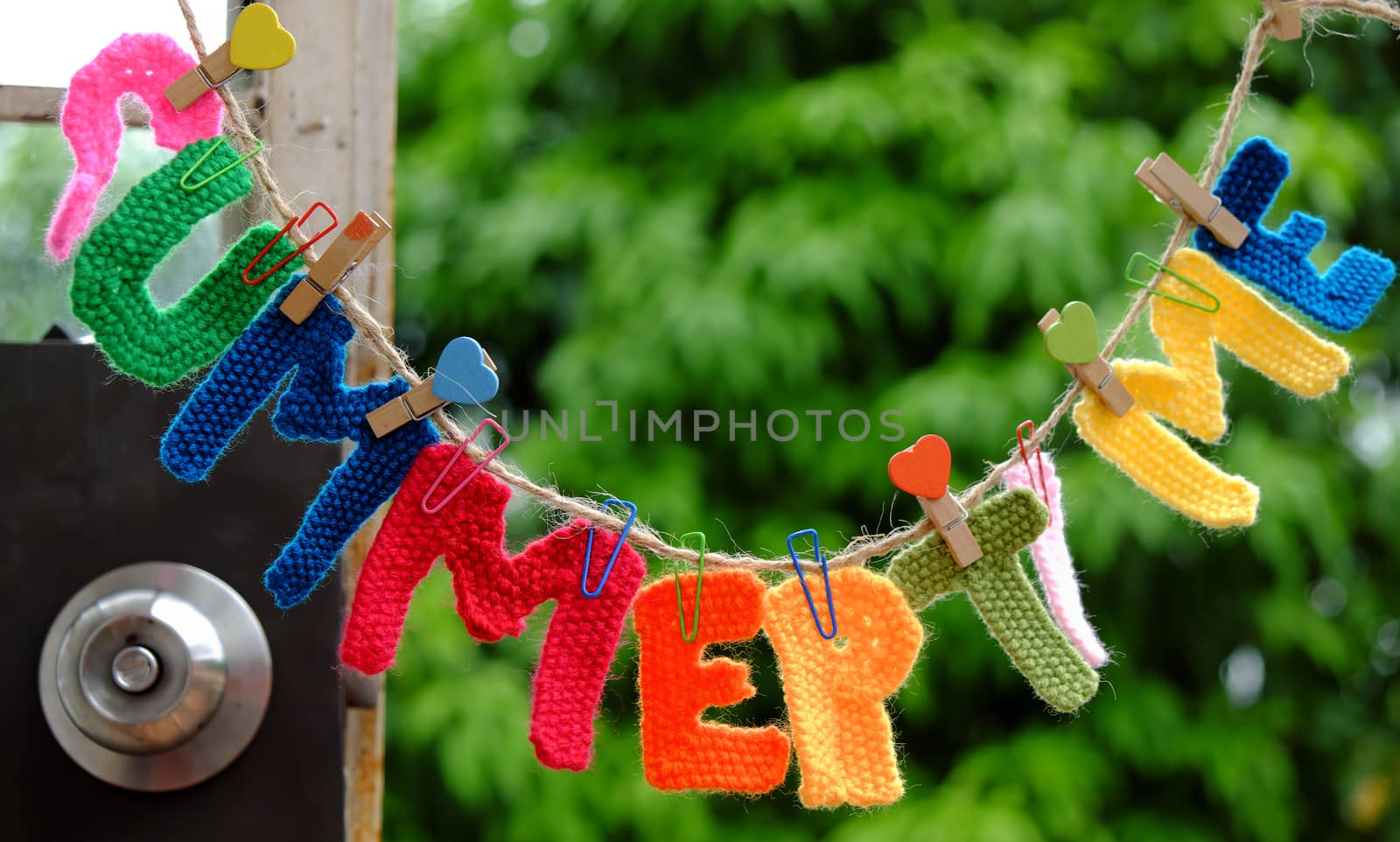 Summer letter hang on rope, summertime background with alphabet on green background