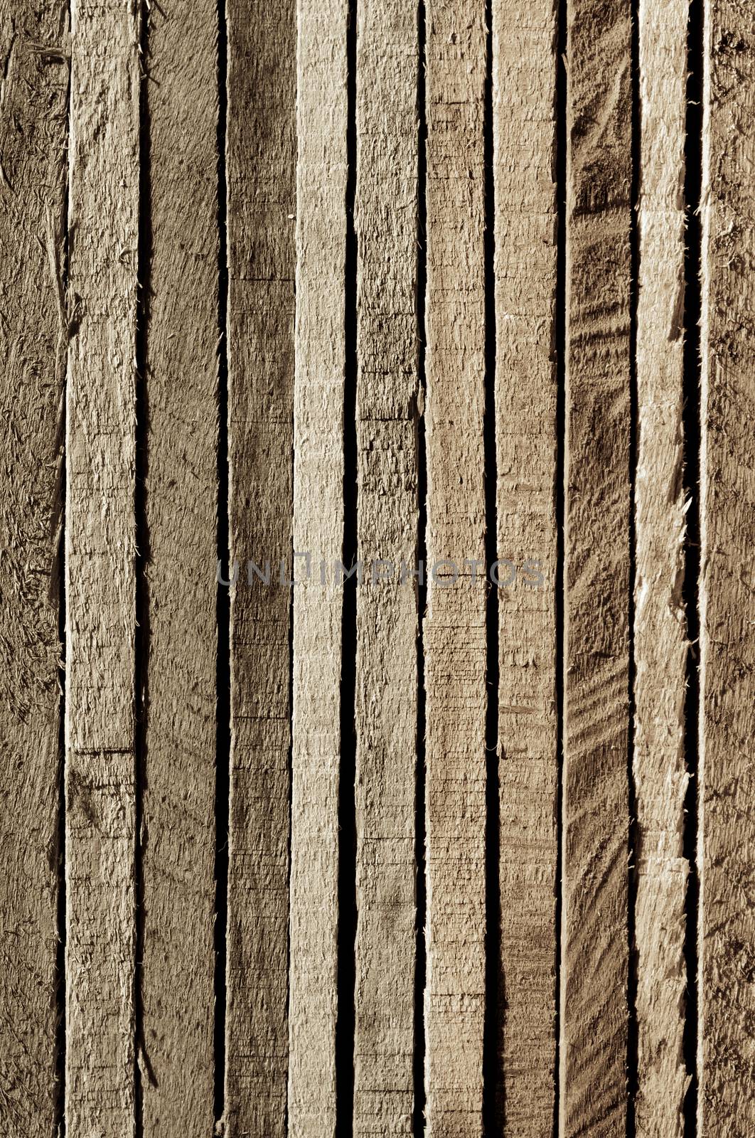 Variegated Natural Colored Background of Cracked Wooden Plank closeup. Sepia Toned