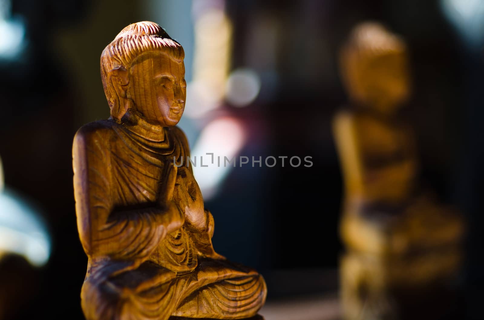 Buddha statue in meditation by luisapuccini