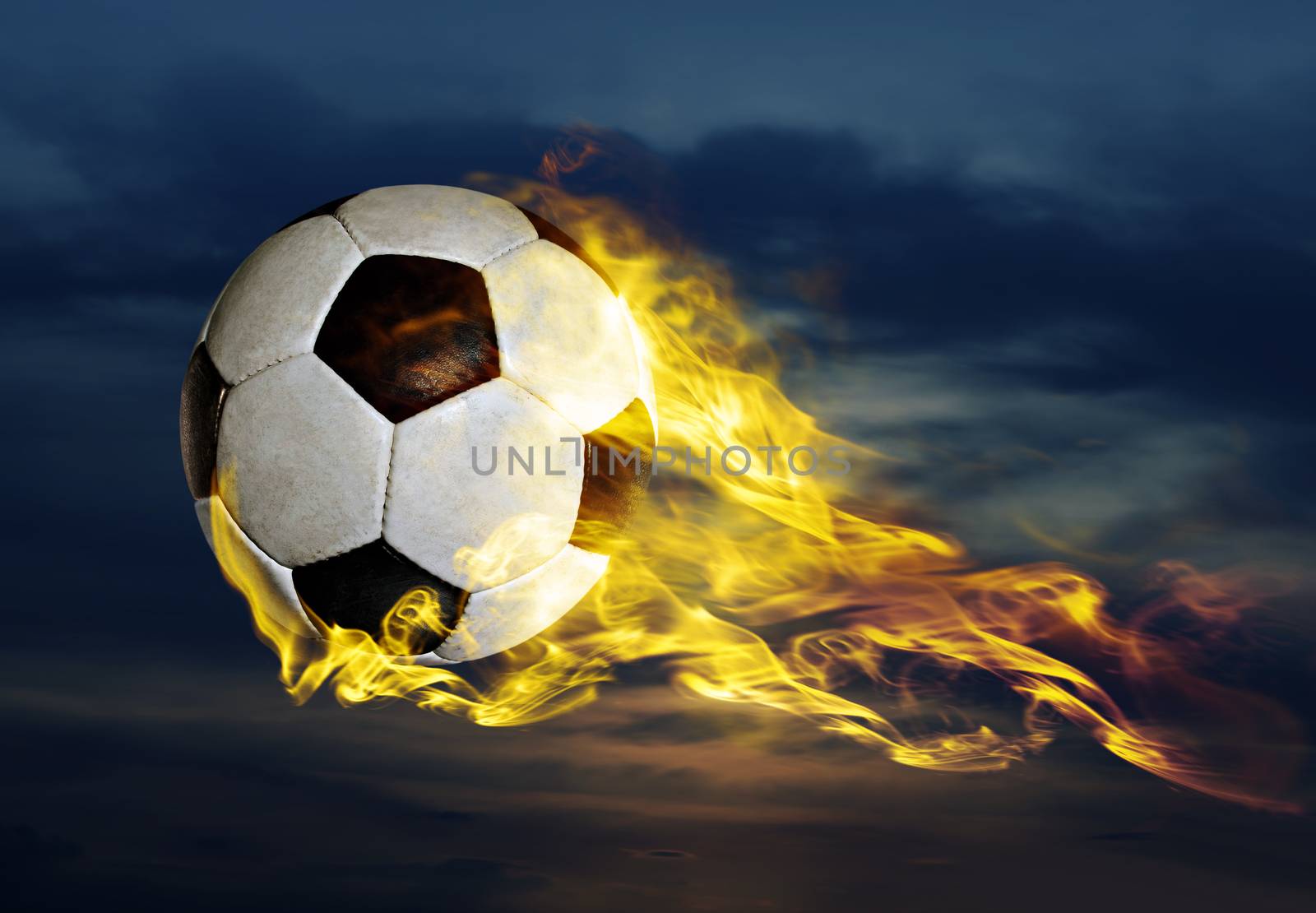 flying fiery soccer ball in sky