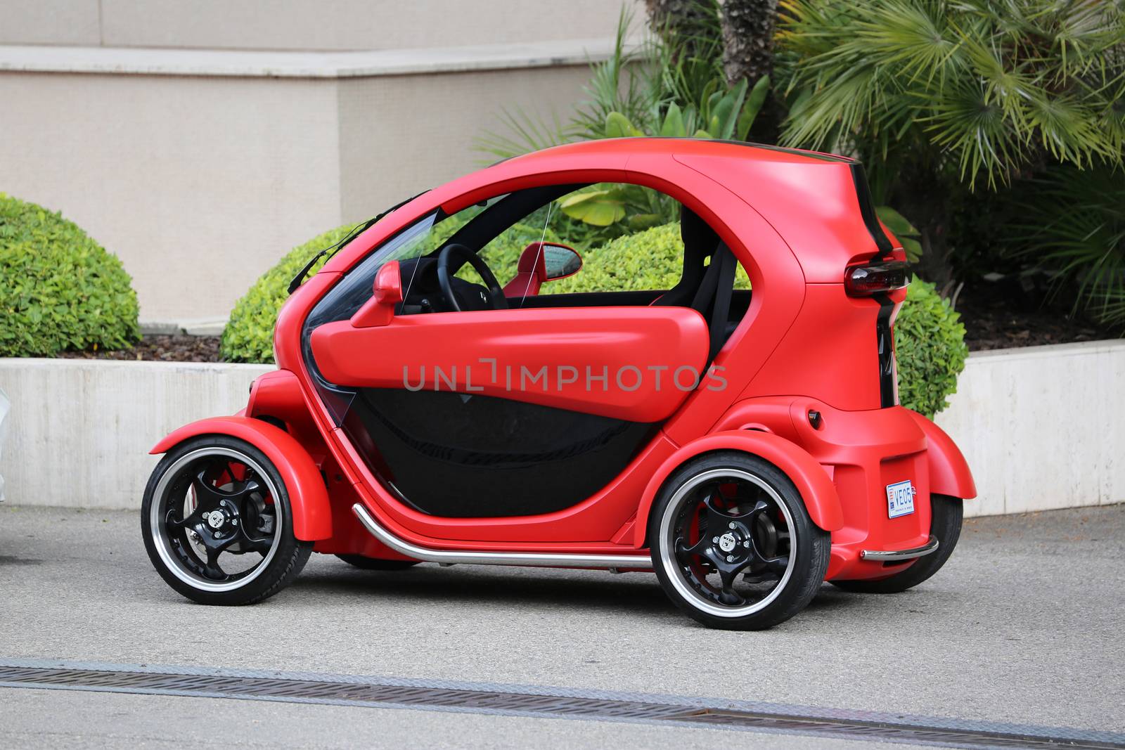 Red and Black Electric Car Renault Twizy in Monte-Carlo, Monaco by bensib