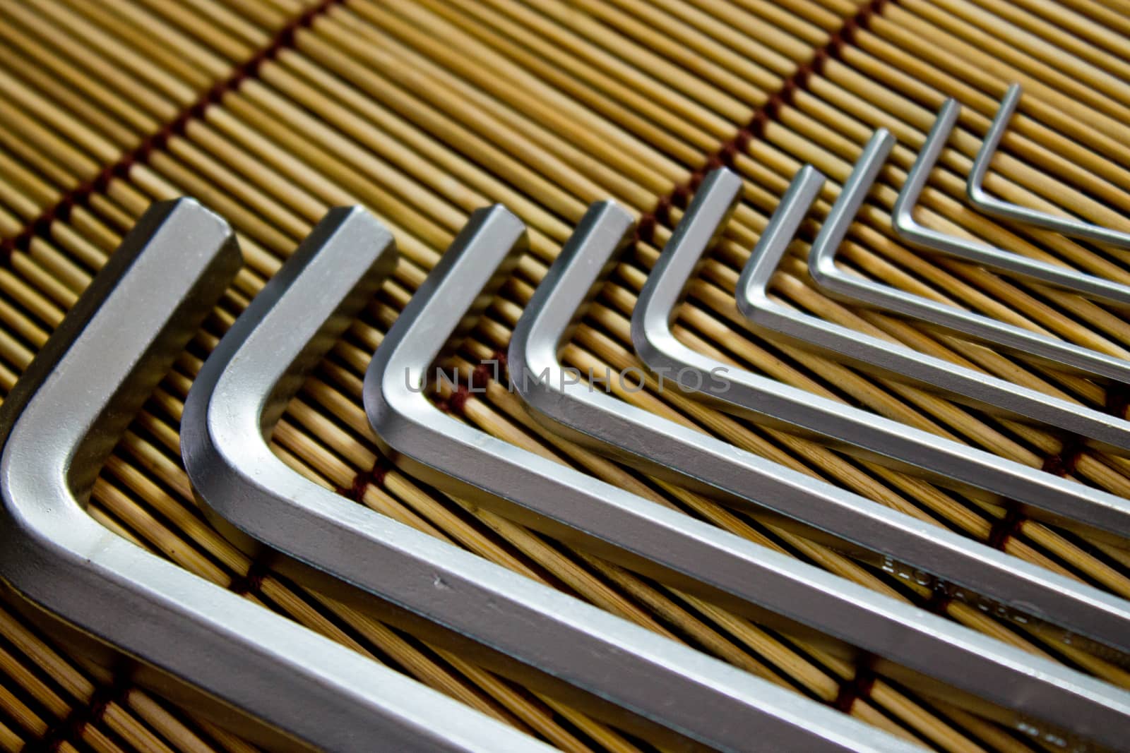 Close up of lined hex keys in a pattern