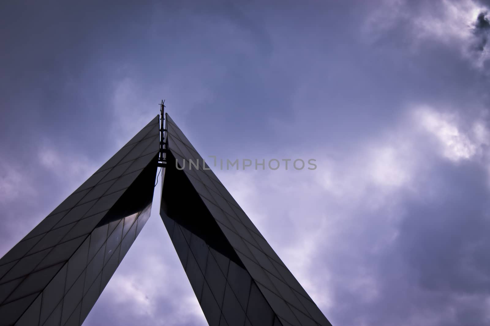 high section of monument against cloudy sky