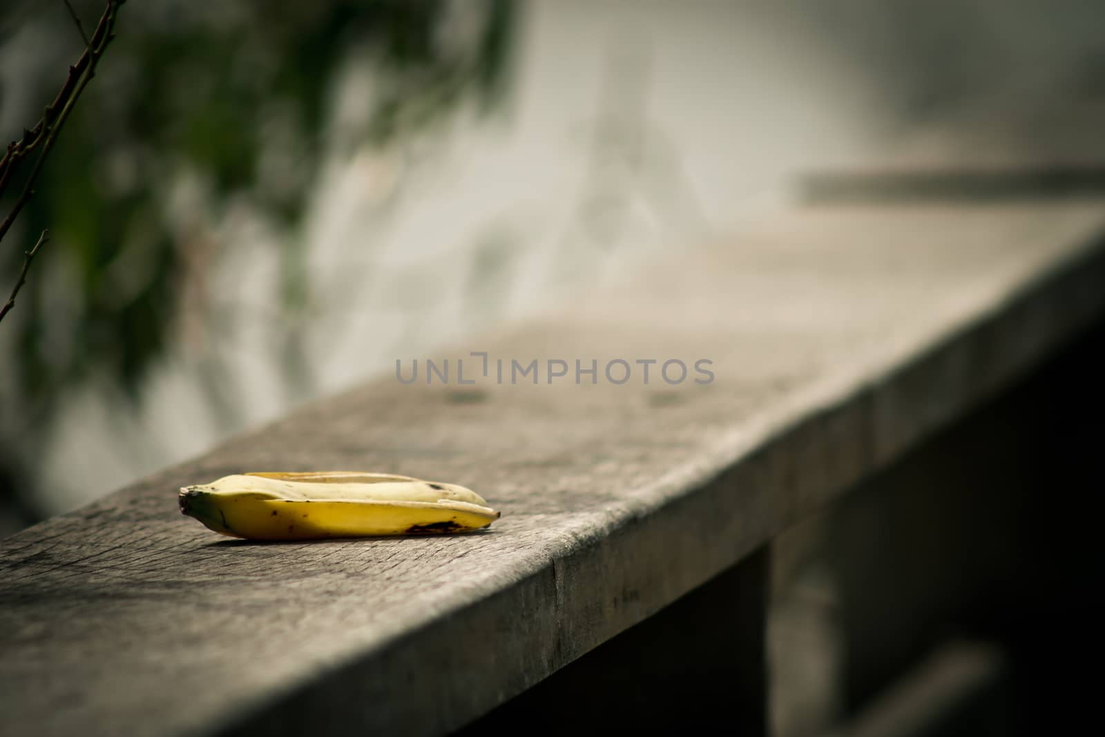 Banana peel on wooden fence