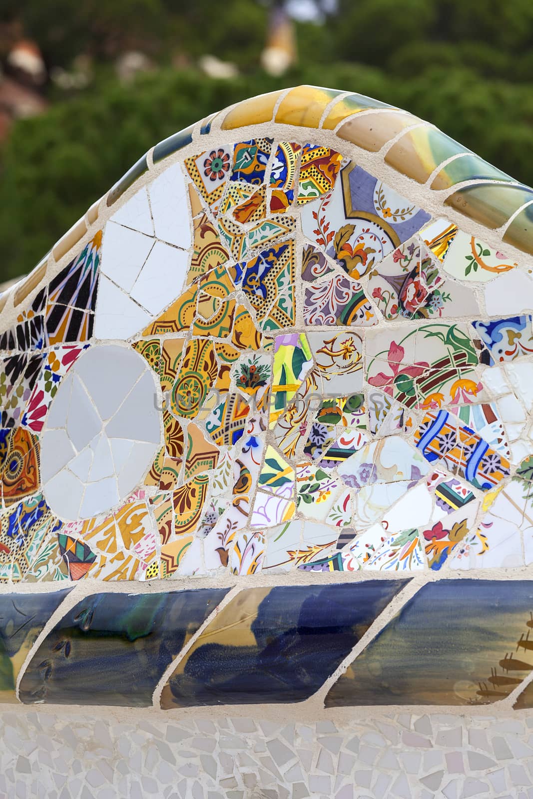 Gaudi multicolored mosaic bench  in Park Guell; Barcelona; Spain