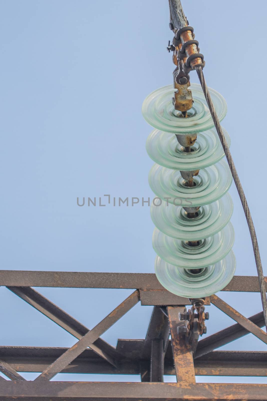 electric insulator on the background of blue sky