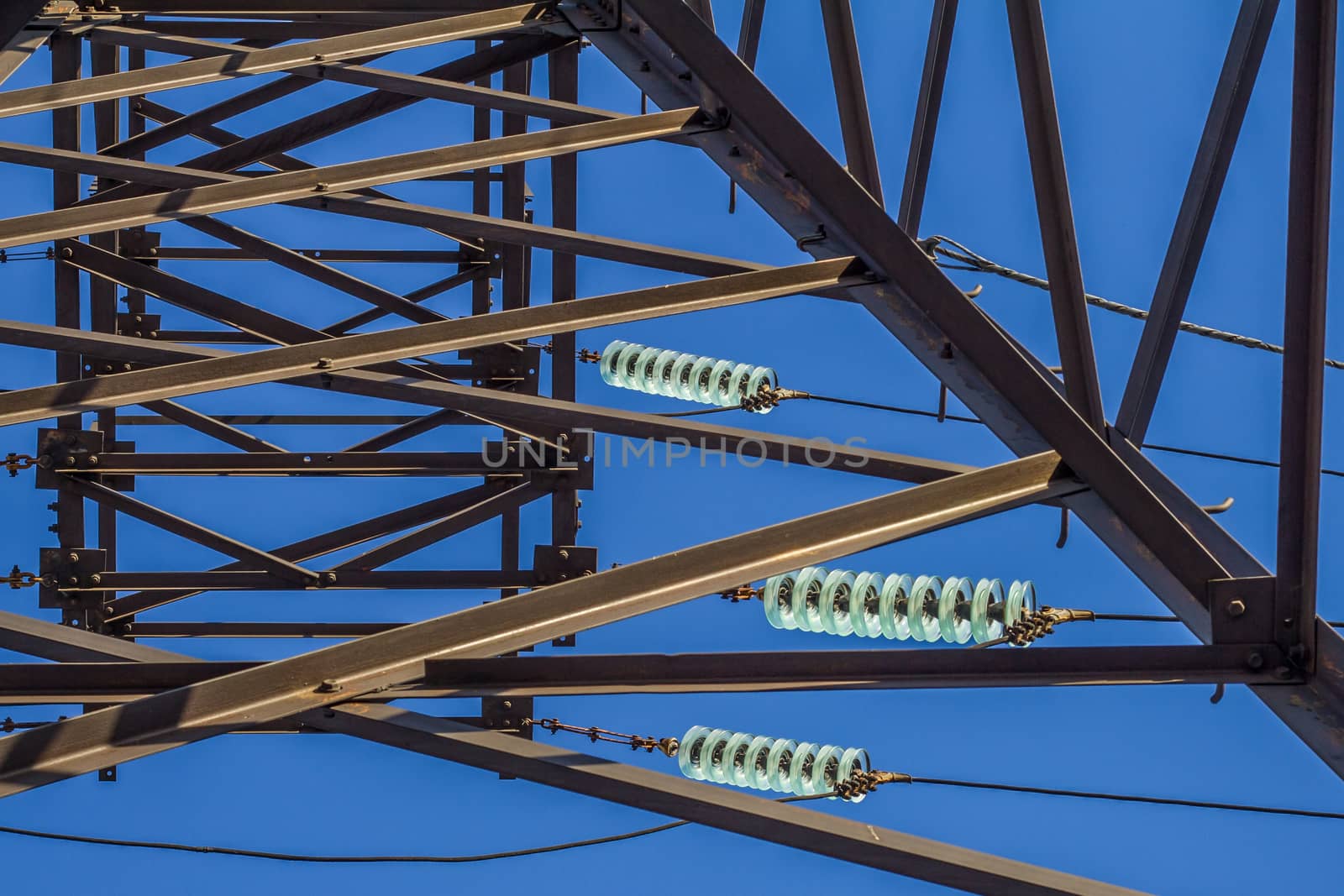 electric insulator on the background of blue sky