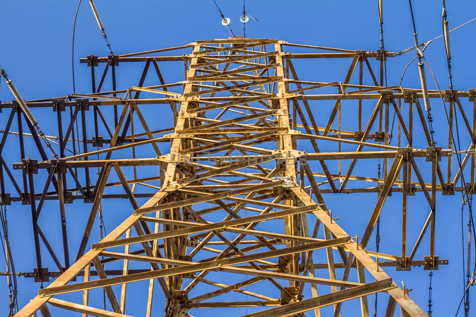 electric insulator on the background of blue sky