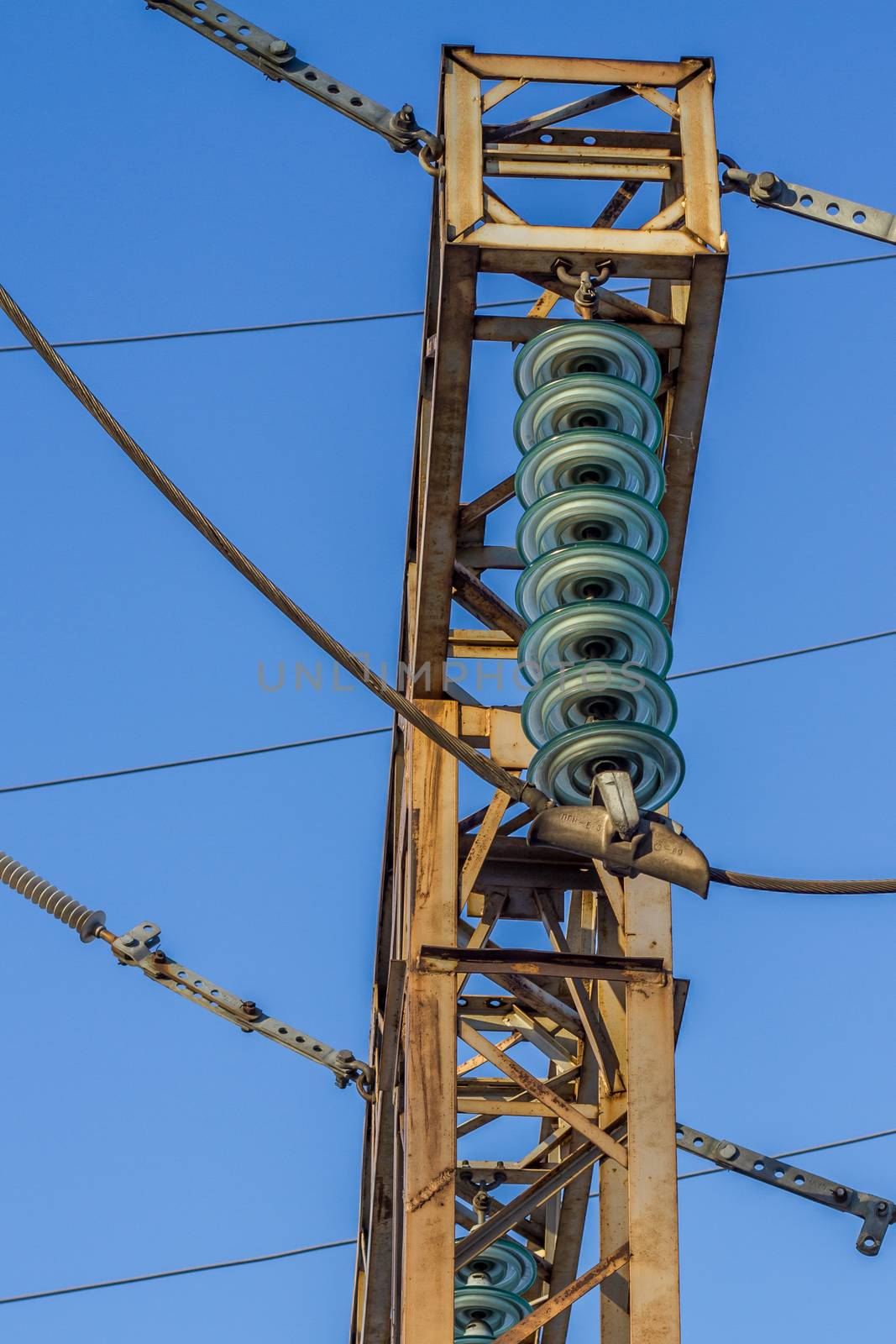 electric insulator on the background of blue sky