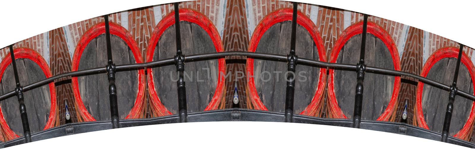 Six old beer, whiskey or wine barrels, wooden in a row on a white background.