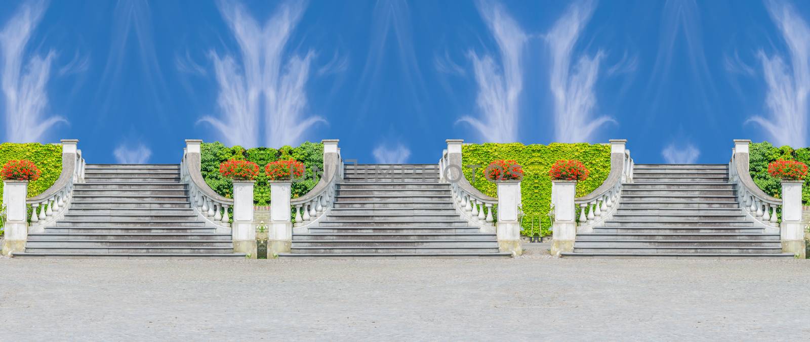 Three old stone stairs to heaven. 3 Stone stairs in the background a blue sky.
