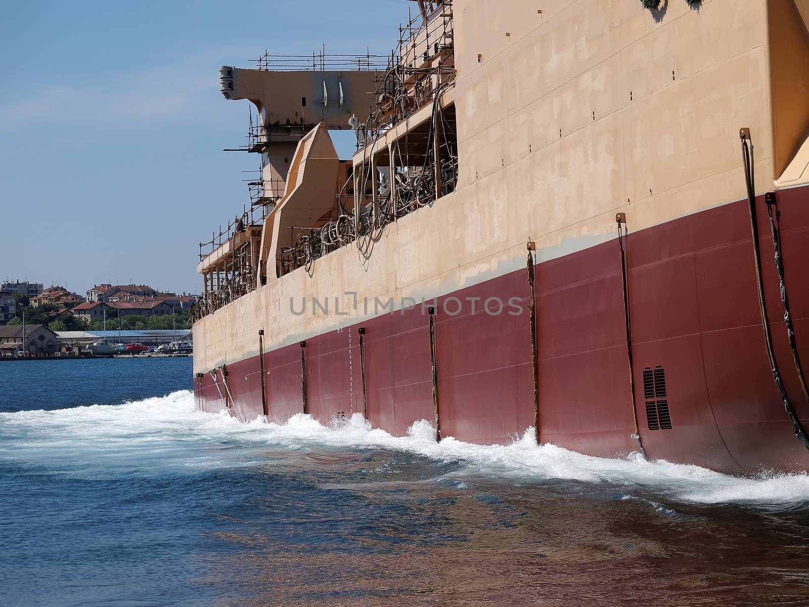 ship launching in shipyard, side view