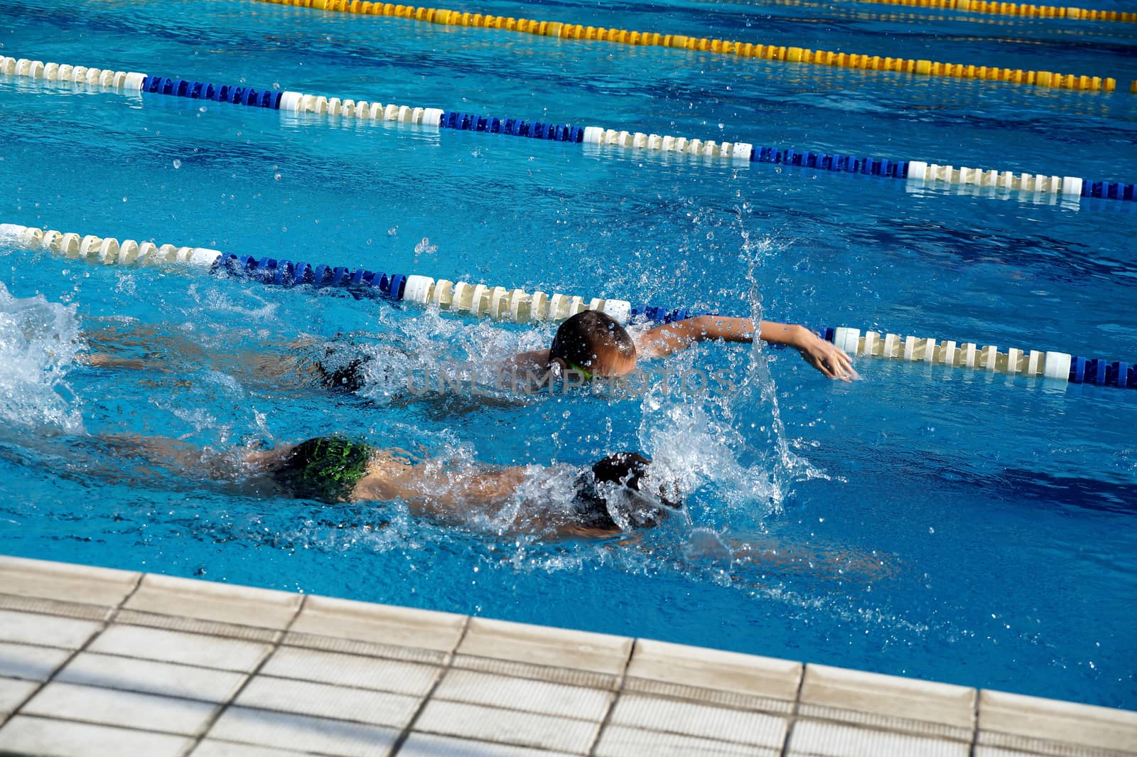 Heat of children on one path in the swimming pool