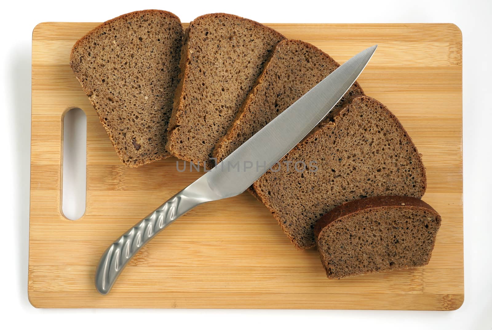 Average utility knife with a metal handle on a chopping board