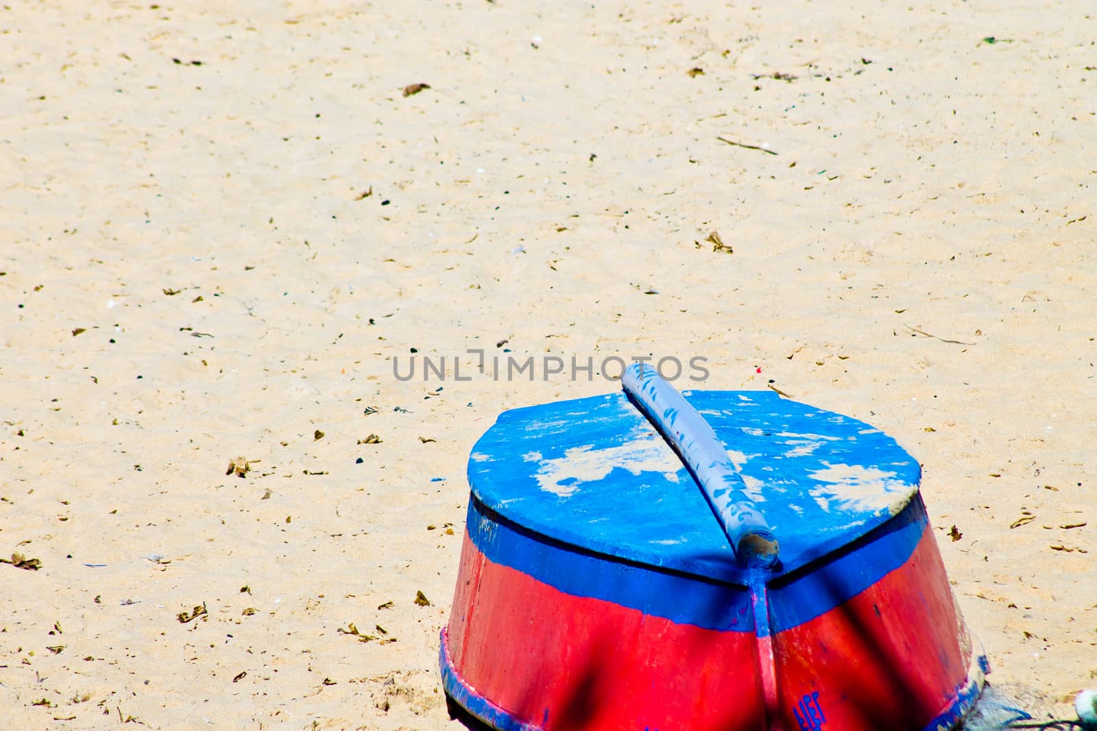 Fishing boat upside down on the sand
