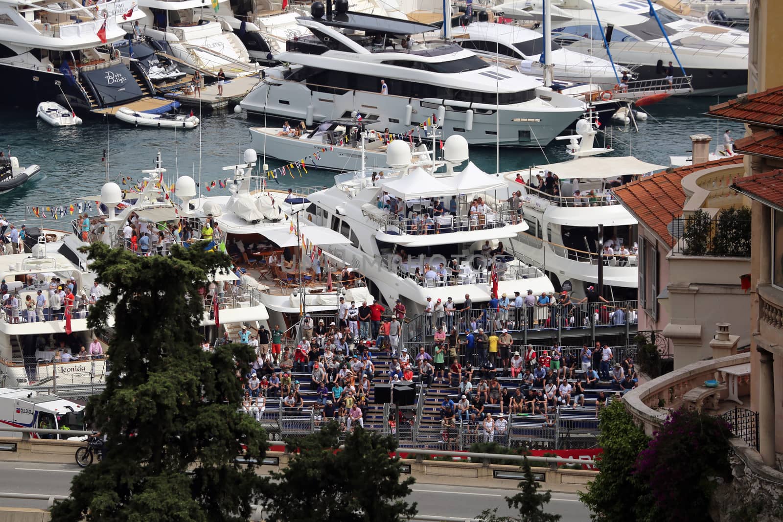 La Condamine, Monaco - May 28, 2016: Many Spectators in the Tribunes and People on Yachts For the Monaco Formula 1 Grand Prix 2016