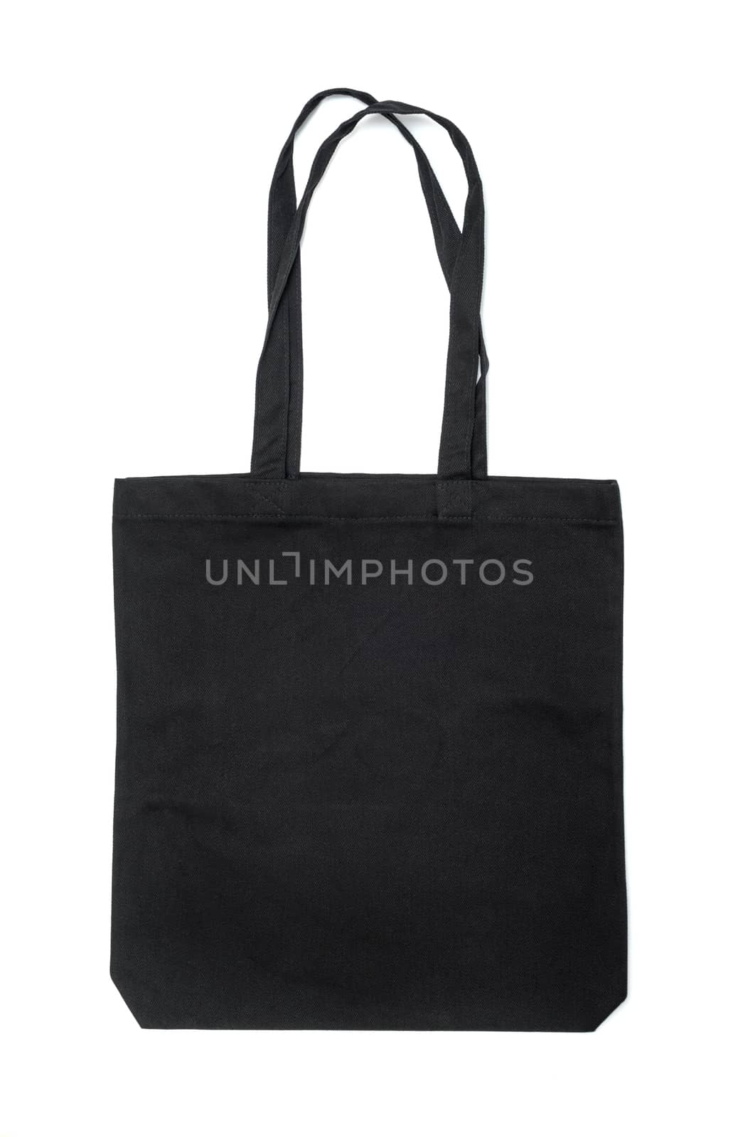 Black fabric bag isolated on white background by DNKSTUDIO