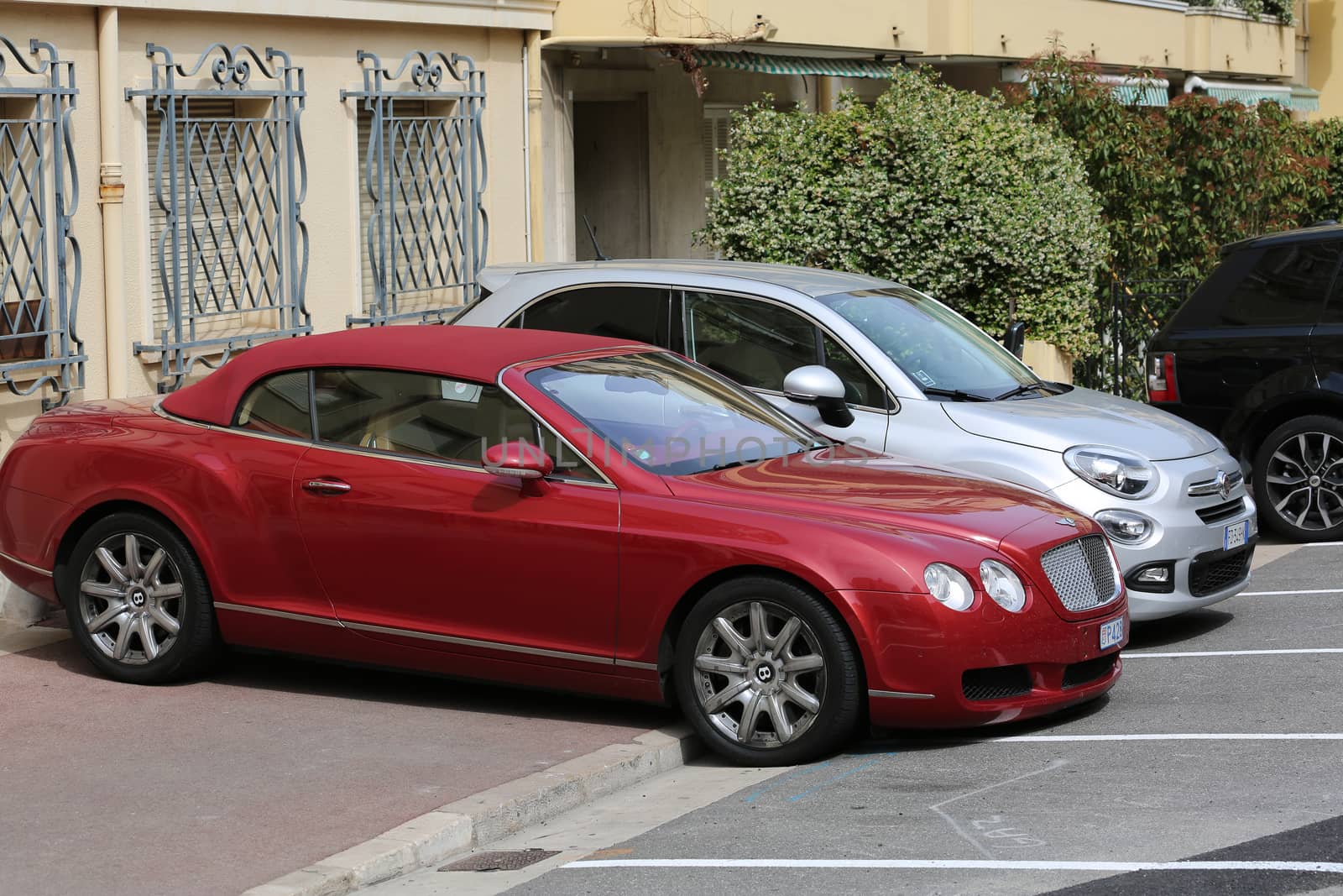 Monte-Carlo, Monaco - May 28, 2016: British Luxury Car Bentley Continental GTC Badly Parked on the Sidewalk in Monaco