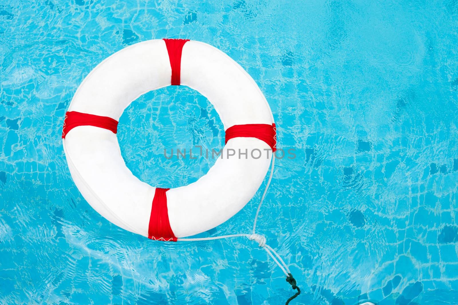 Life Ring at the swimming pool. Life Ring on water. Life Ring on by nopparats