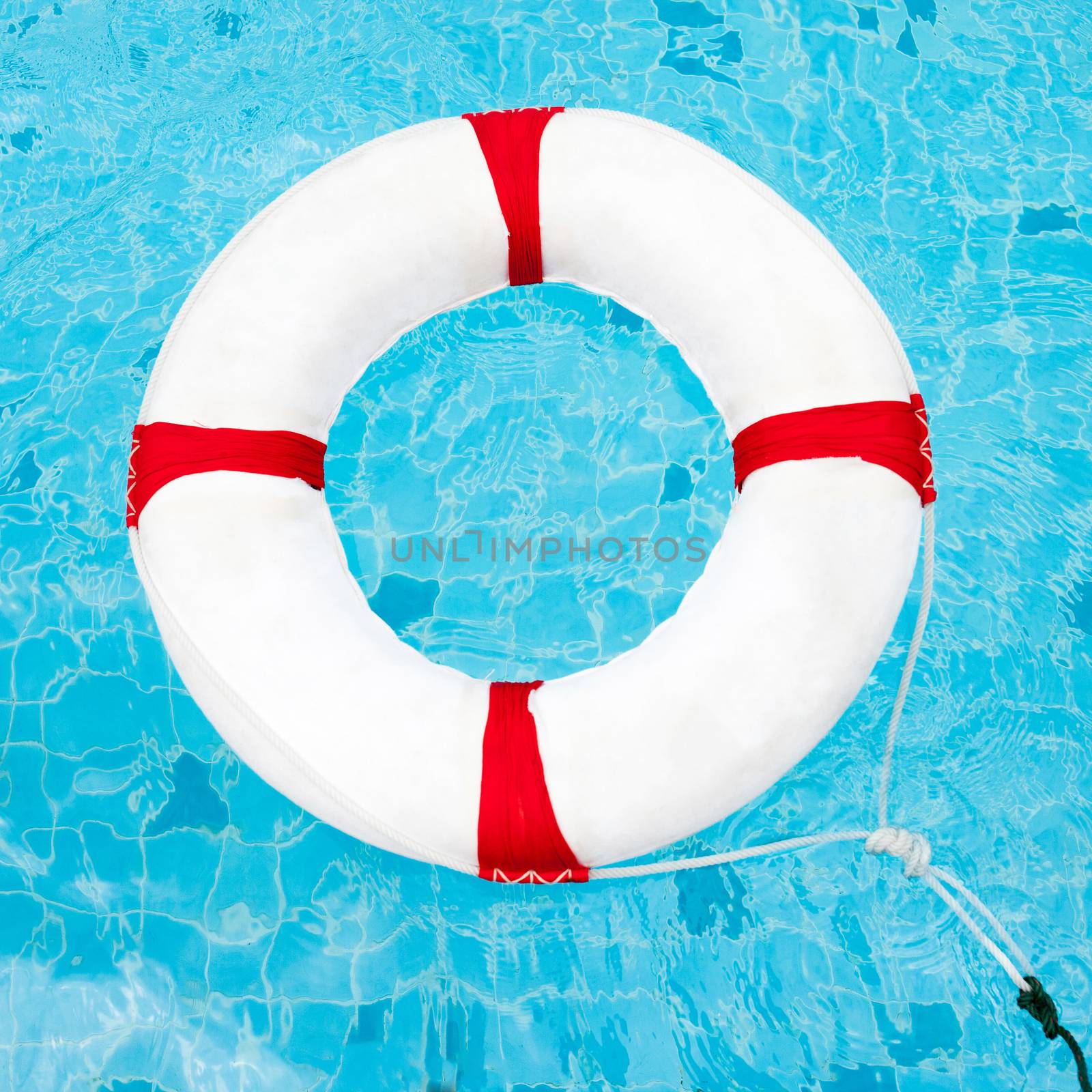 Life Ring at the swimming pool. Life Ring on water. Life Ring on by nopparats