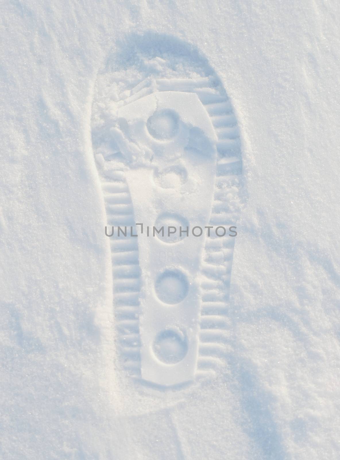 Image of footprint in snow.