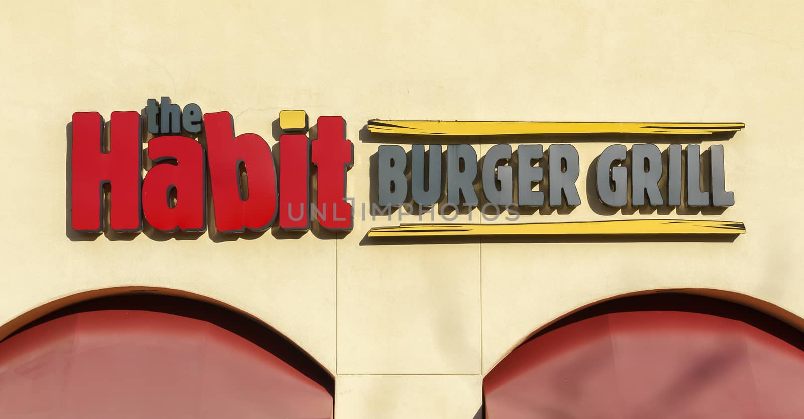 SANTA CLARITA, CA/USA - DECEMBER 28, 2015: The Habit Burger Grill exterior and logo. The Habit is a fast casual restaurant chain.