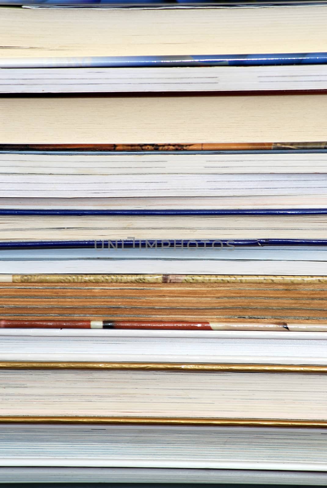 Detail image of stack of books.