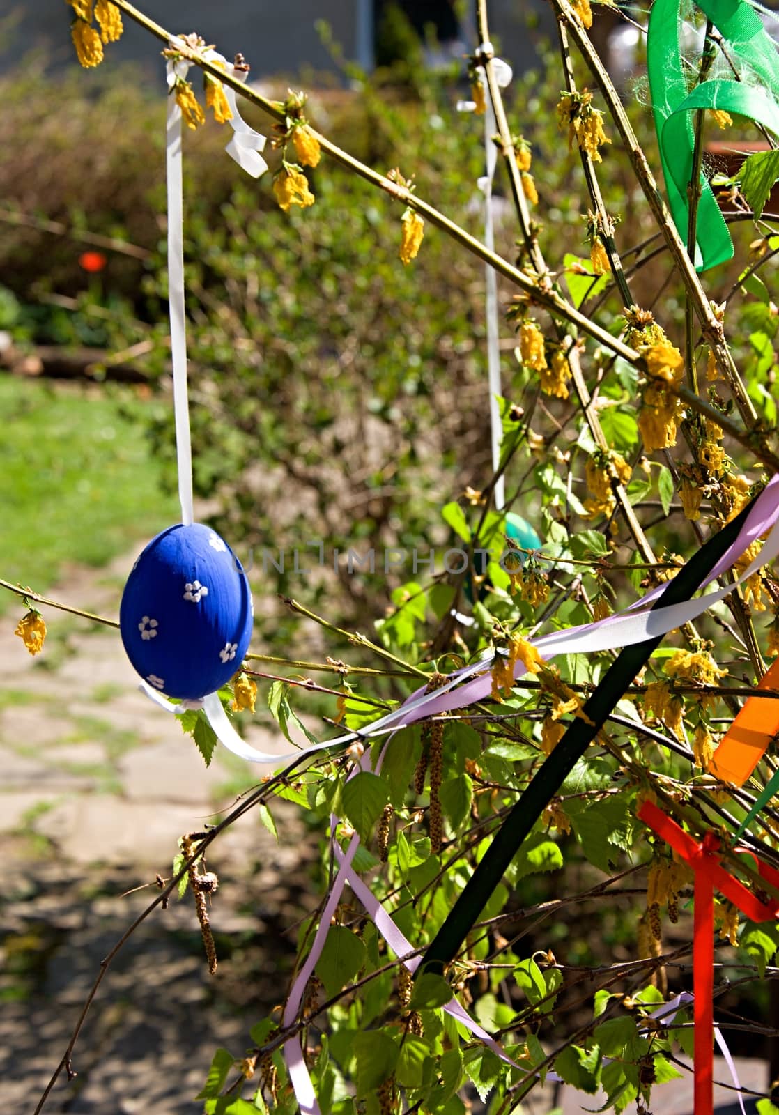 Easter decoration. Egg and some branches.