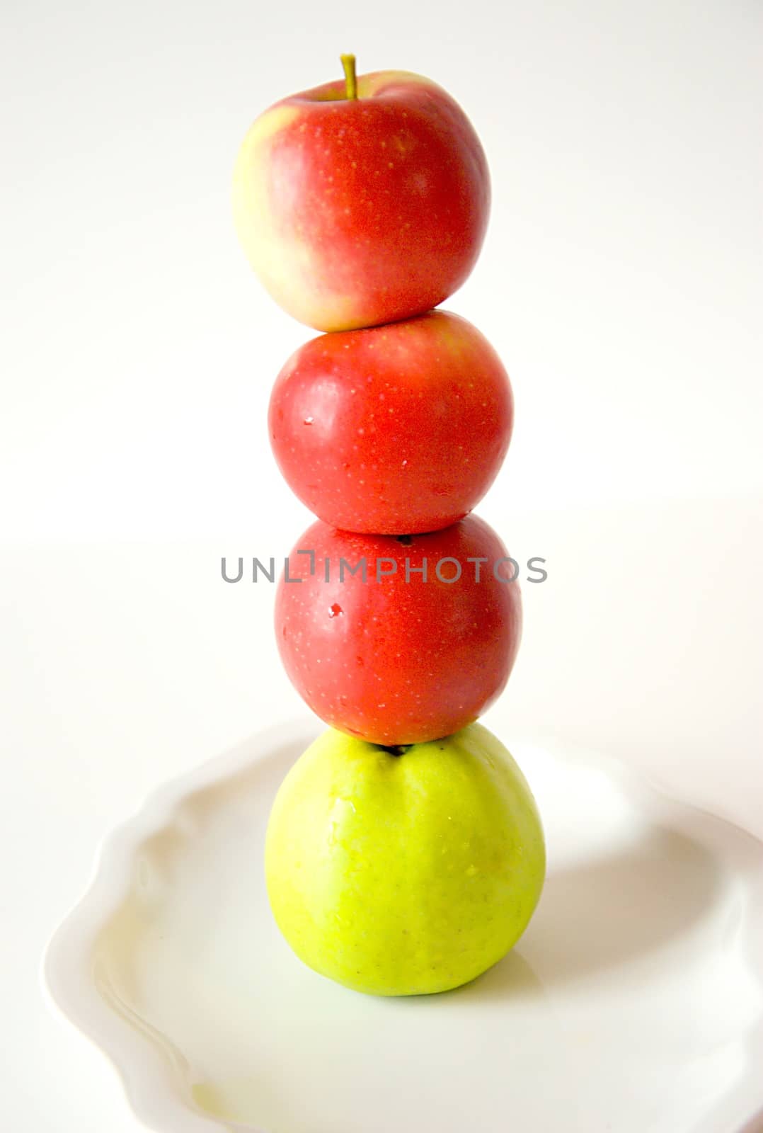 Autumn fruits in the dish on eatch other.