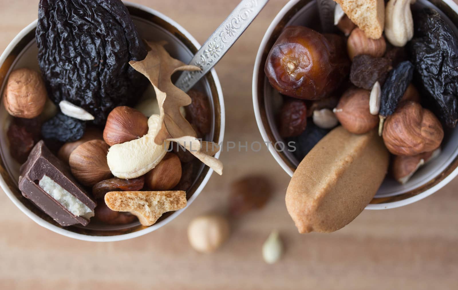 dried fruit mix in cup with spoon