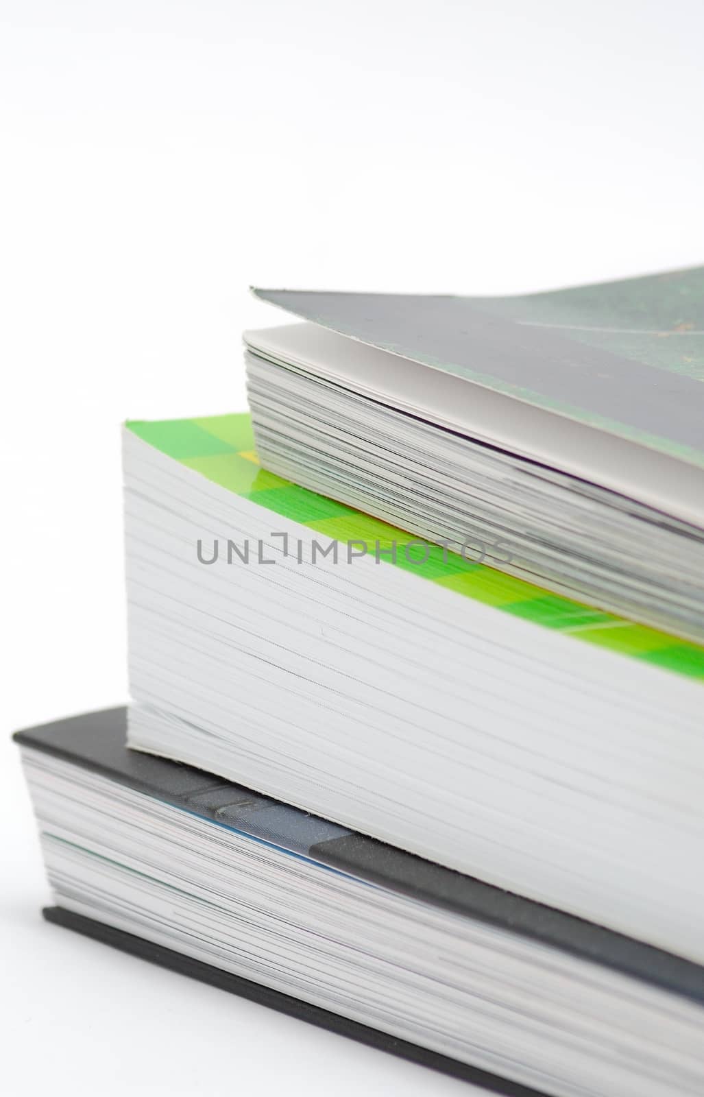 Stack of various book isolated on the white background.