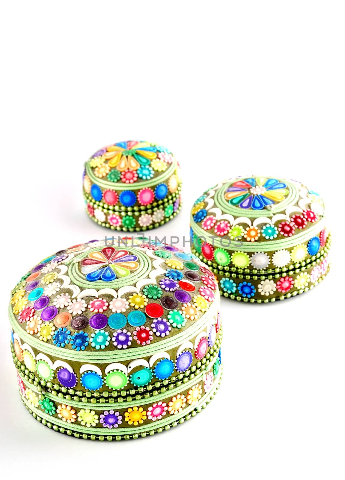 Colored jewel boxes isolated on the white background.