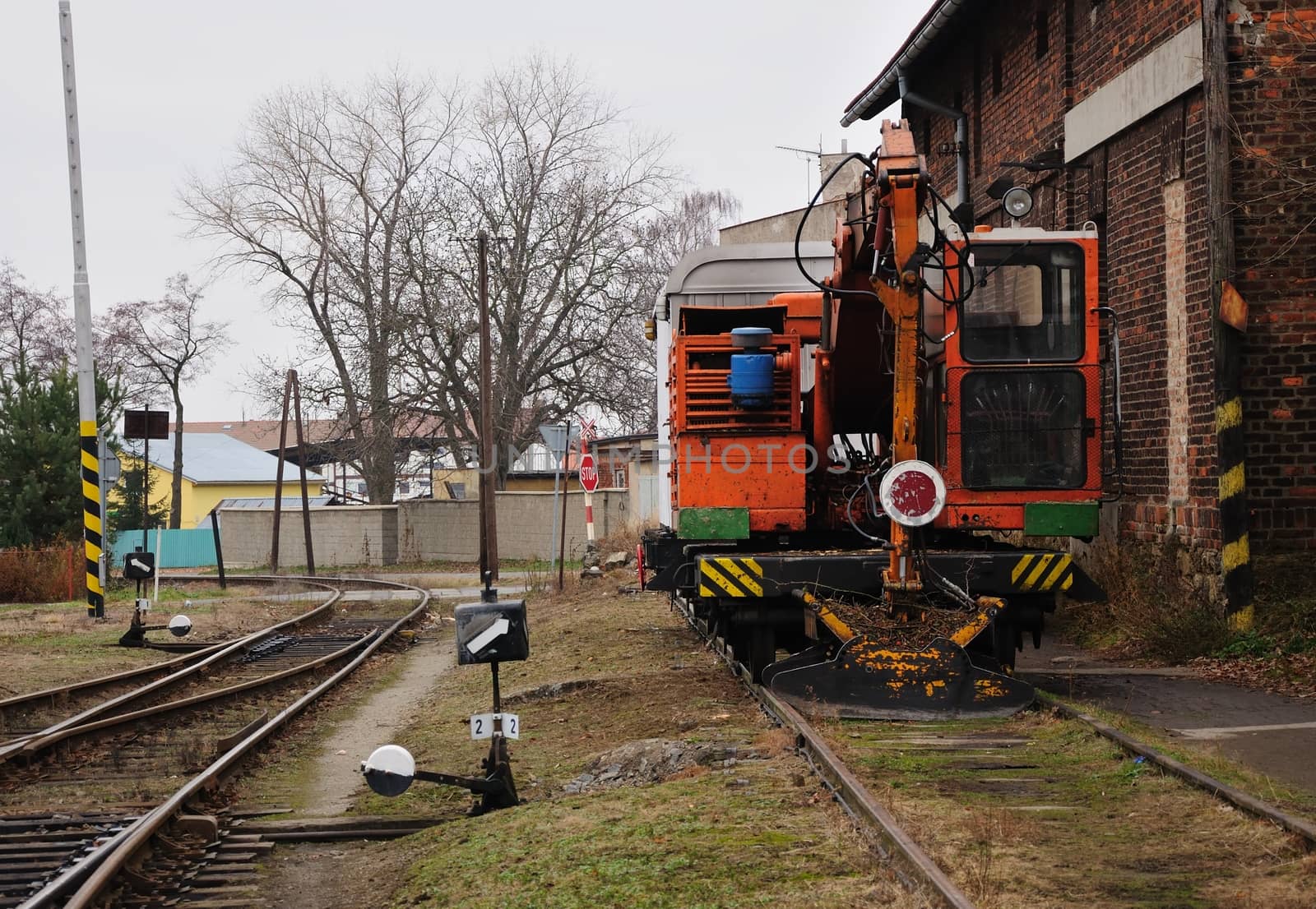 View to the old orange service train parked at station.