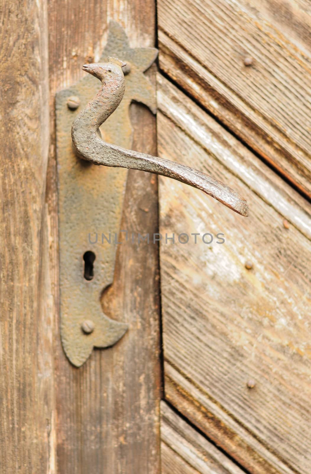 Closeup view to the old door handle.