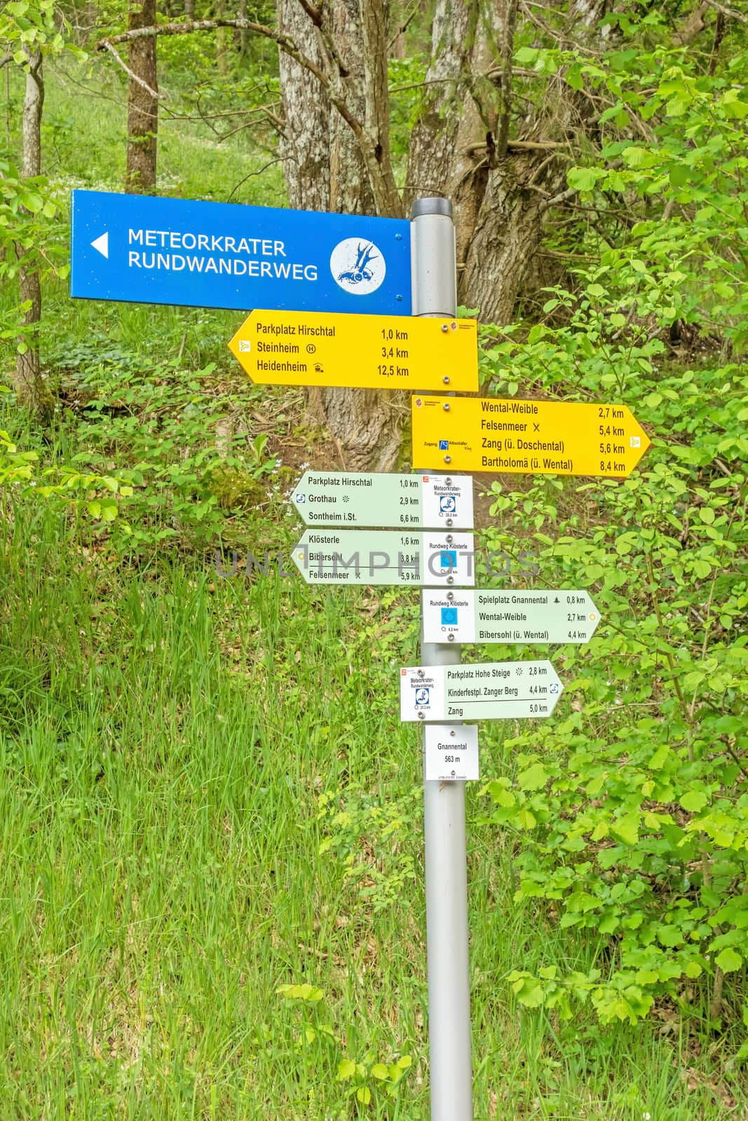 Steinheim, Wental, Germany - May 26, 2016: Wental valley signpost showing path of meteorite crater circular walk (Meteorkrater Rundwanderweg), Swabian Alps (Schwaebische Alp)