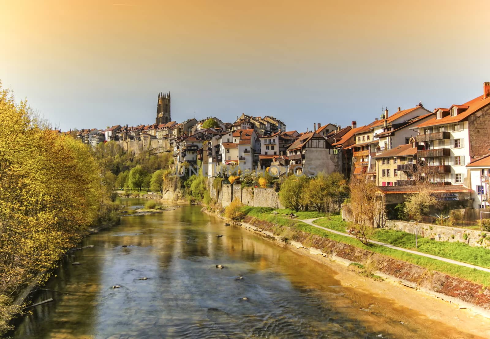 Panoramic view of cathedral of St. Nicholas and Sarine river in Fribourg, Switzerland