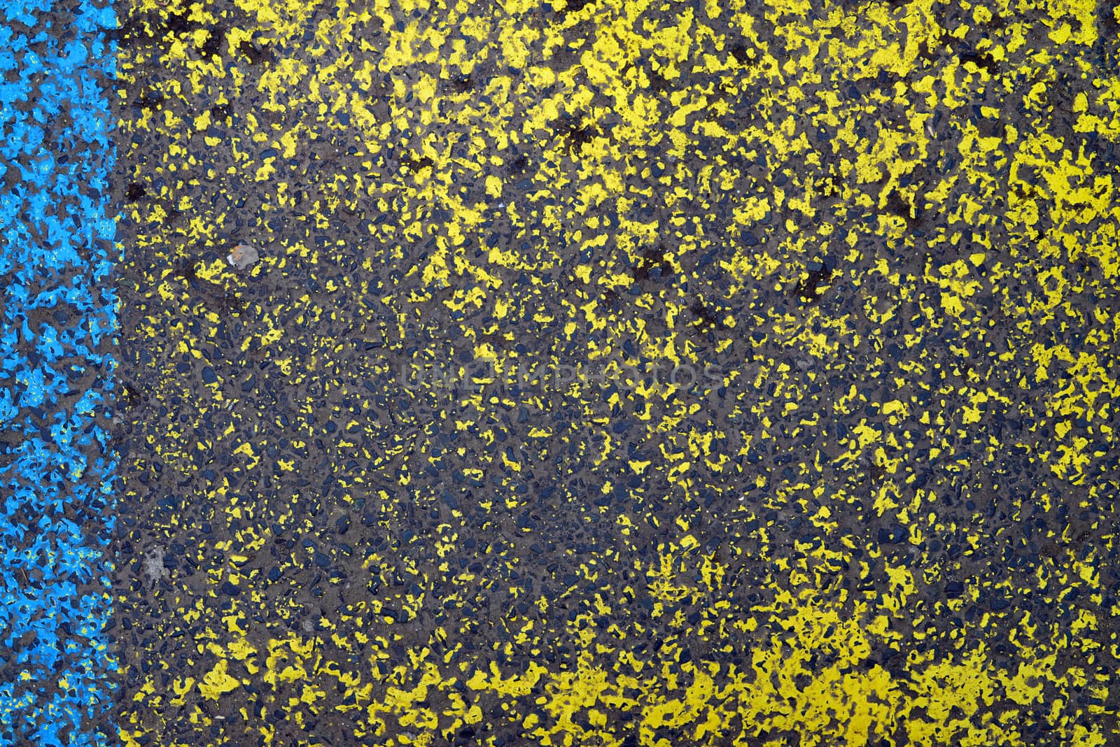 industrial street asphalt grunge yellow and blue paint texture background