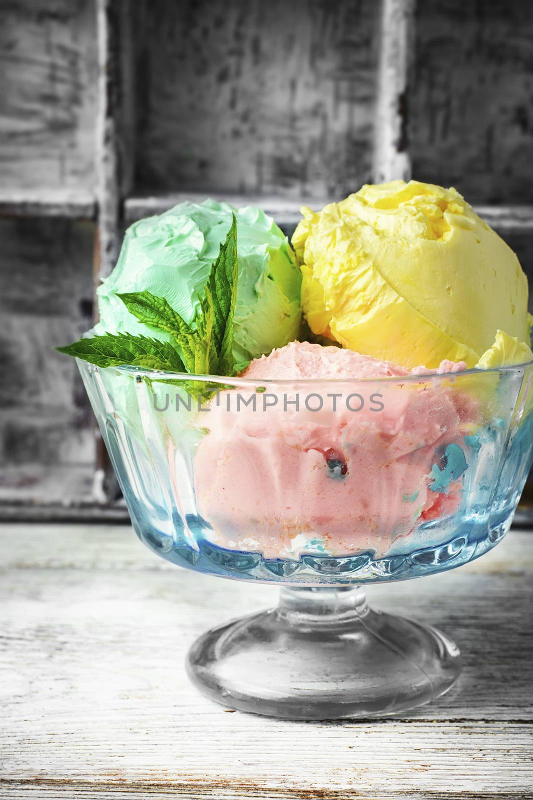 fruit ice cream scattered on background of blueberries