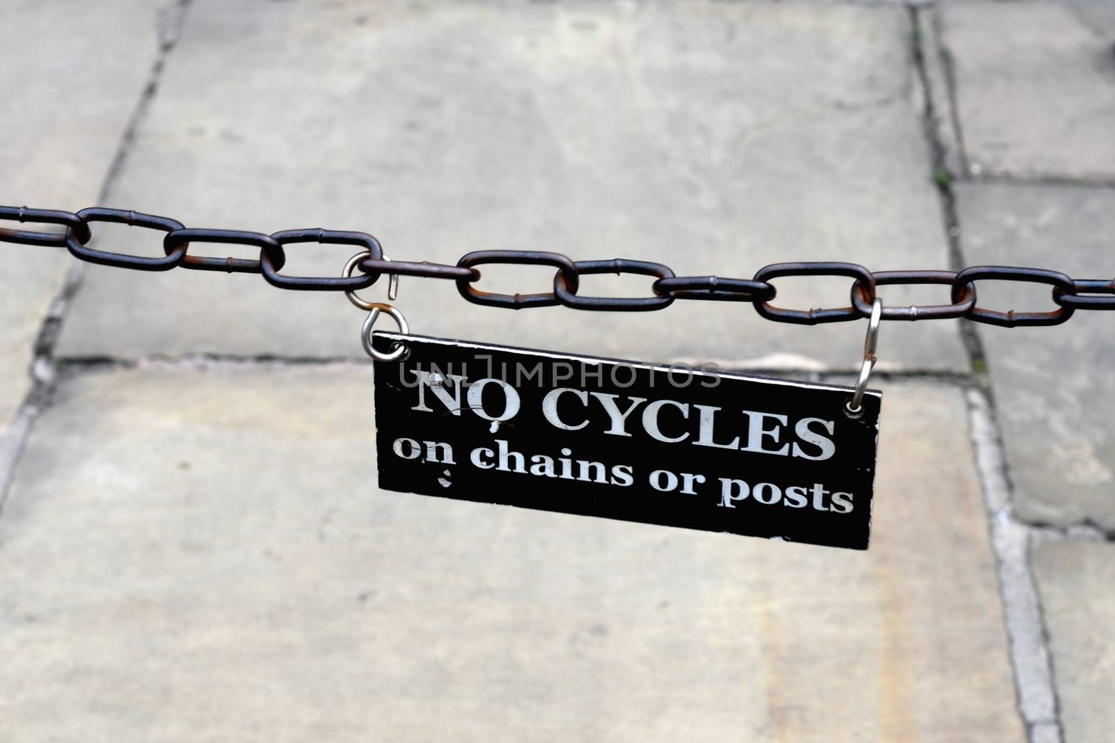 No Cycling sign on chain