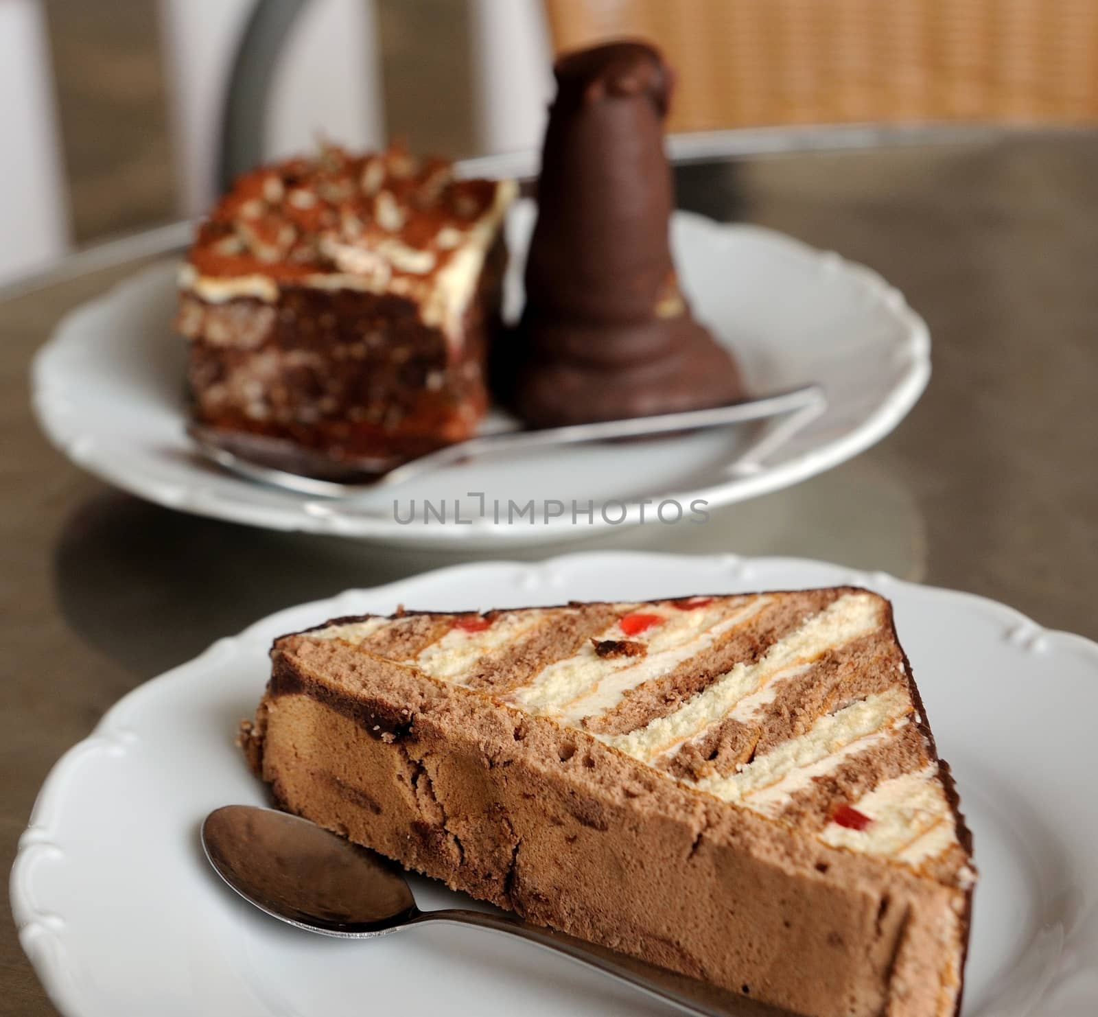 Closeup shot of chocolate desserts on the table in sweet shop.